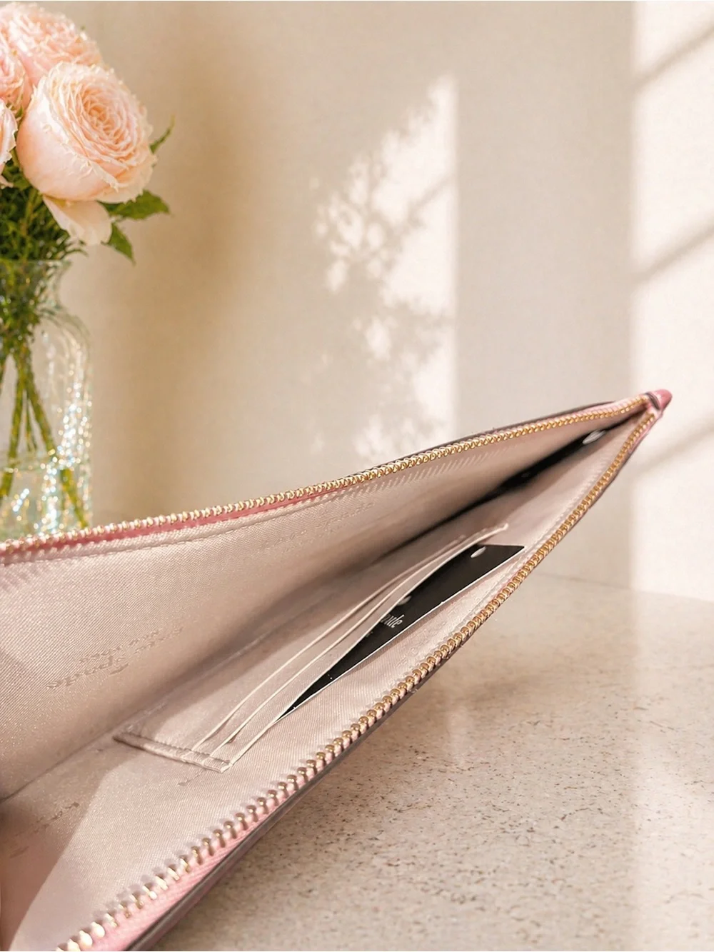 kate spade New York Metallic Rose Gold Wristlet